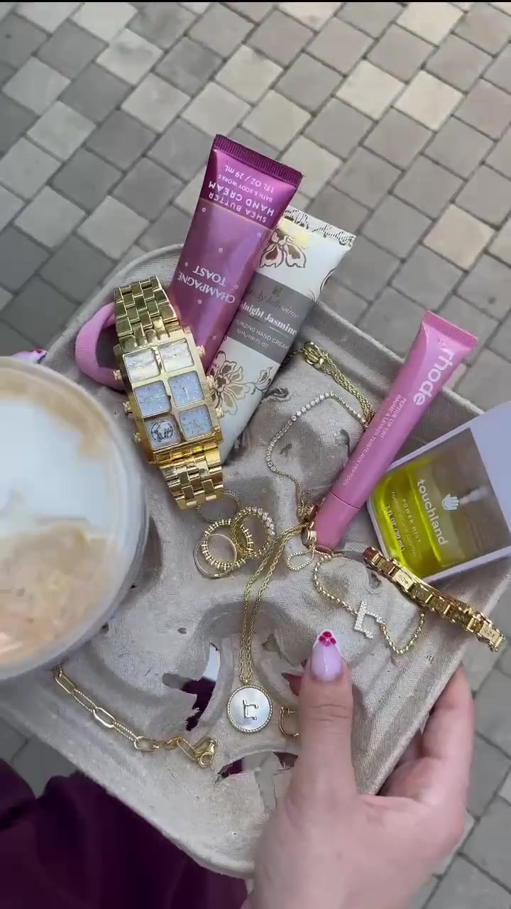 Reel: coffee tray styled with jewelry and beauty products